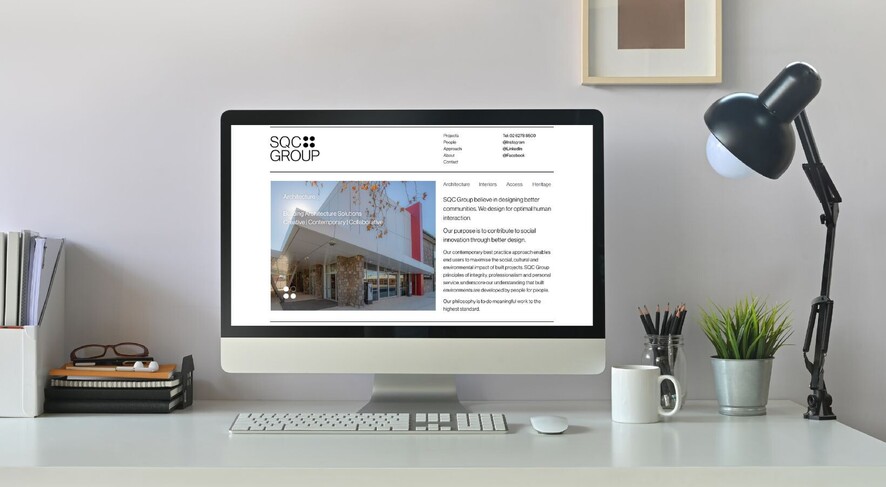 Your Web Presence Work: SQC Group Website on a Laptop