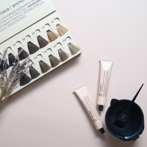 Organic hair colour on counter with colour swatches and lavender.