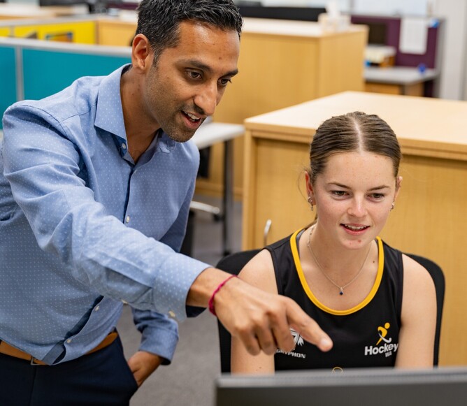 Ajay demonstrating IT processes to Hockey WA