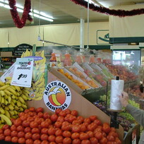 Fresh fruit and vegetables misted in supermarket