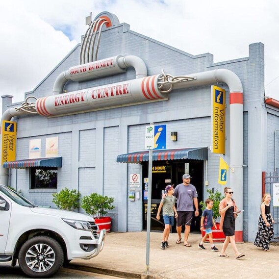 Tourists walking outside the South Burnett Energy Centre