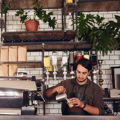 Image of an a Coffee Barista where Food and Beverage Fire Protection Systems are required - Holisitic Fire Services
