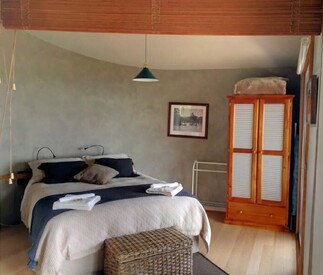 bedroom with curved walls