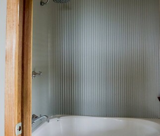 double spa bath with country style corrugated wall panel