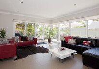 By adding an extension of a lounge room everyone gets a little more space