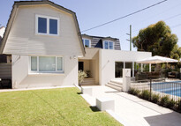 Lounge room extension on this Dutch barn style home