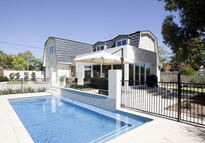 Cafe style living, alfresco and pool area transforms this Dutch barn into an oasis