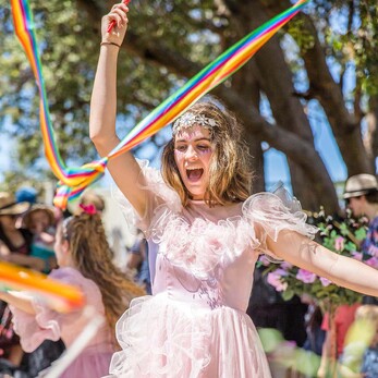 Pink Hairy Twisting a Ribbon