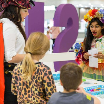 Rainbow Fairy Leading an Activity