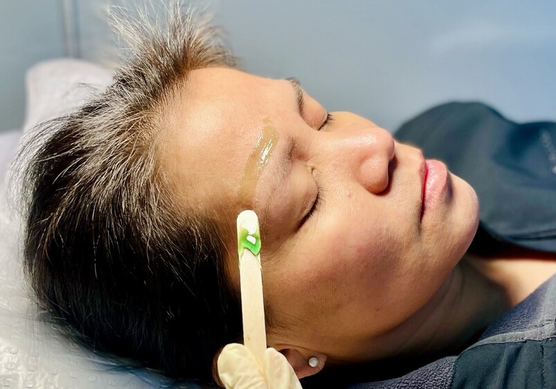 Image of person getting eyebrows waxed at Princess Nails Spa and Beauty
