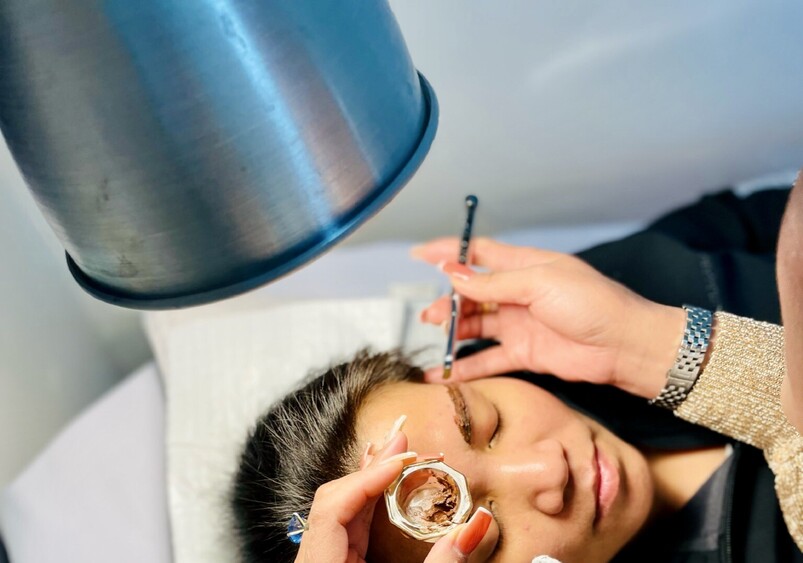 Image of Sophie tinting eyebrows at Princess Nails Spa and Beauty