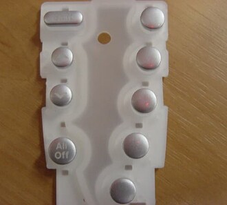 Silicone keypad with metalized keycaps