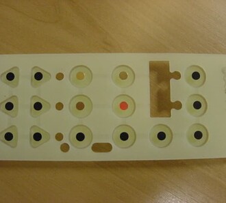 Silicone keypad with gold plated pills
