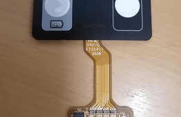 FPC flexible circuit with SMT component assembly on keypad tail.
