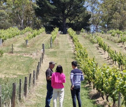 A photo of Colin (the winemaker at Flaxman wines) hosting a tasting