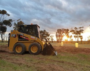 How much does it cost to hire a skid steer loader, posi track or bobcat?