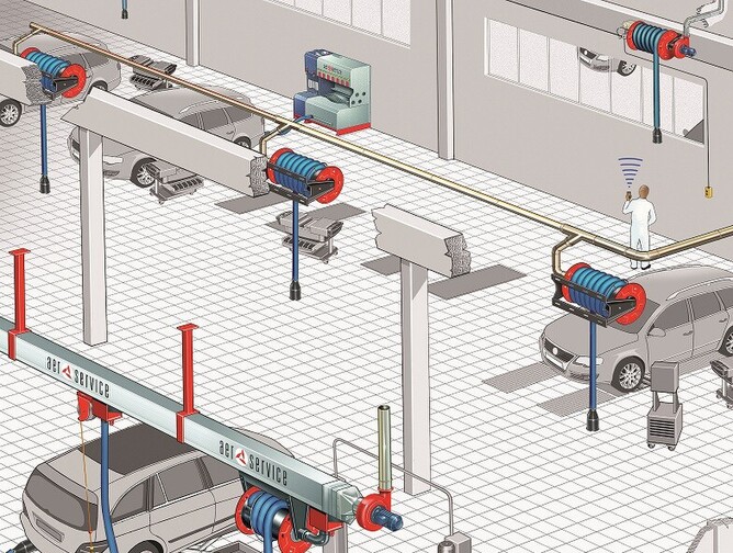 Diagram of auto workshop with ducted exhaust fume extraction system including hose reels