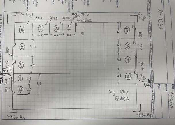 Snapshot of a ventilation engineer's drawings of a solution for a client on a piece of grid notepaper
