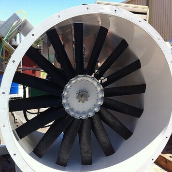 large industrial centrifugal fan in white casing