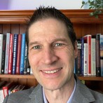 Image of Damien Hughes, Chairperson and Director