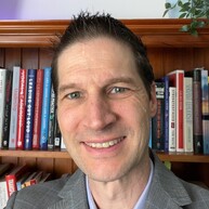 Image of Damien Hughes, Chairperson & Director