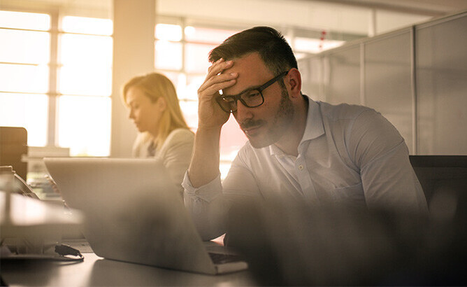 Person frustrated with a computer